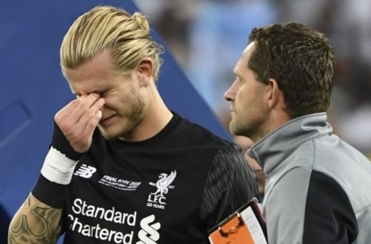 Reaksi kiper Liverpool Loris Karius setelah melakukan blunder saat menghadapi Real Madrid di final Liga Champions. Paul ELLIS / AFP