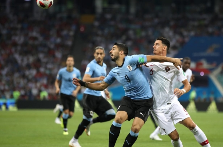 Aksi Luis Suarez saat kontra Portugal di babak 16 besar Piala Dunia 2018.