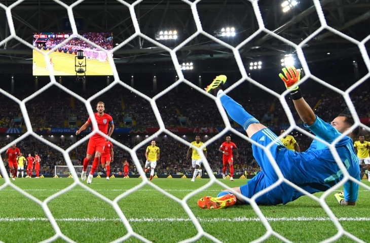 Eksekusi Harry Kane di titik putih berhasil kecoh kiper Kolombia, David Ospina.