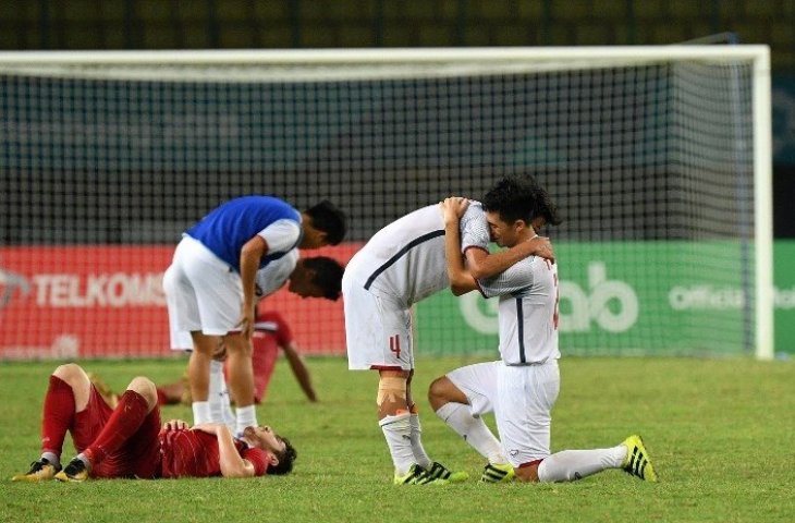 Timnas Vietnam U-23 saat merayakan kemenangan atas Suriah di babak 8 besar Asian Games 2018. (Juni Kriswanto/AFP).