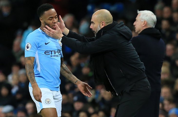 Pemain Manchester City Raheem Sterling dan Pelatih Pep Guardiola (AFP)