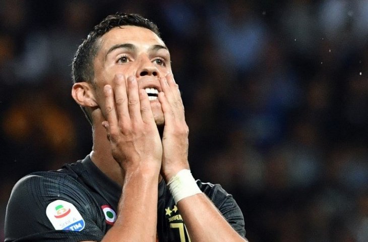 Ekspresi Cristiano Ronaldo saat tendangannya meleset ke gawang Parma (Andreas Solaro/AFP)