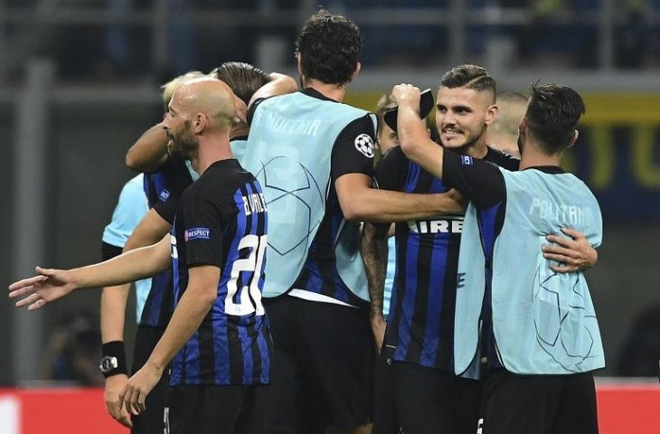 Para penggawa Inter Milan merayakan gol  Mauro Icardi saat membobol gawang Tottenham Hotspur pada 18 September 2018 (Miguel Medina/AFP)