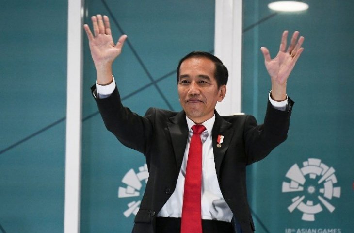 Presiden Republik Indonesia, Joko Widodo saat menghadiri pembukaan Asian Games 2018 di Stadion Gelora Bung Karno pada 18 Agustus 2018 (Jewel Samad/AFP)