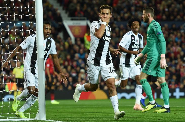 Pemain Juventus, Paulo Dybala merayakan gol ke gawang Juventus di Liga Champions (AFP)