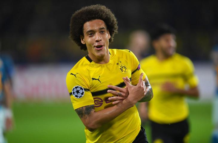 Pemain Borussia Dortmund, Axel Witsel merayakan gol ke gawang Atletico Madrid pada pertandingan Liga Champions grup A (AFP)