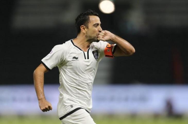 Xavi Hernandez merayakan gol ke gawang Al-Rayyan pada 7 Desember 2016 (AFP)