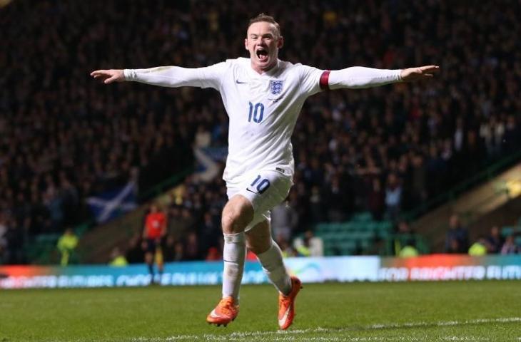 Selebrasi Wayne Rooney saat mencetak gol ke gawang Skotlandia pada 18 November 2014 (Ian MacNicol/AFP)