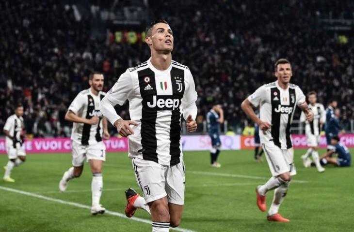 Cristiano Ronaldo dan Mario Mandzukic bawa kemenangan Juventus atas tamunya SPAL di laga lanjutan Serie A, Minggu (25/11/2018). Dalam laga itu Juventus menang 2-0. [MARCO BERTORELLO / AFP]