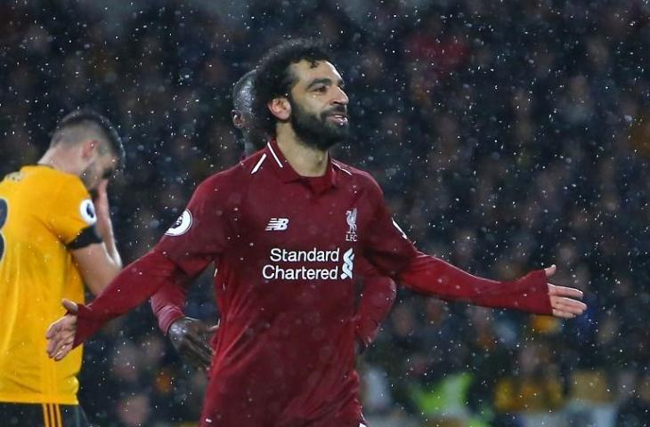 Mohamed Salah merayakan golnya ke gawang Wolverhampton pada 21 Desember 2018 (Geoff Caddick/AFP)