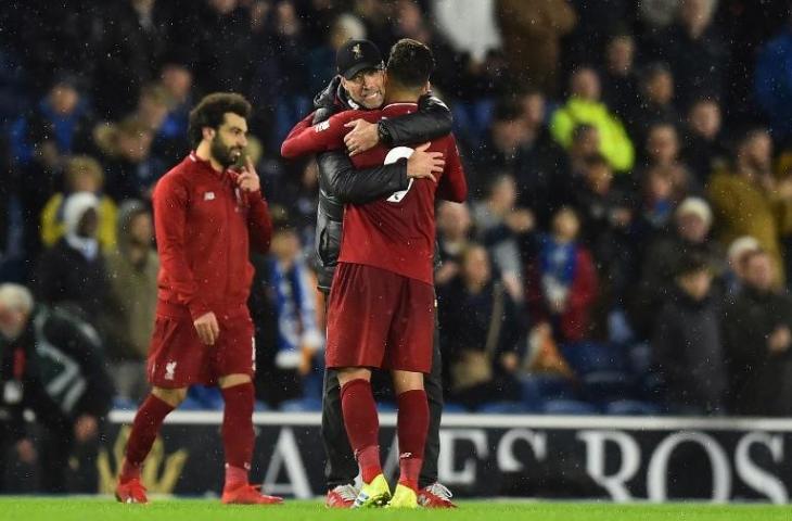 Jurgen Kloop usai Liverpool meraih kemenangan atas Brighton. (Glyn Kirk/AFP).