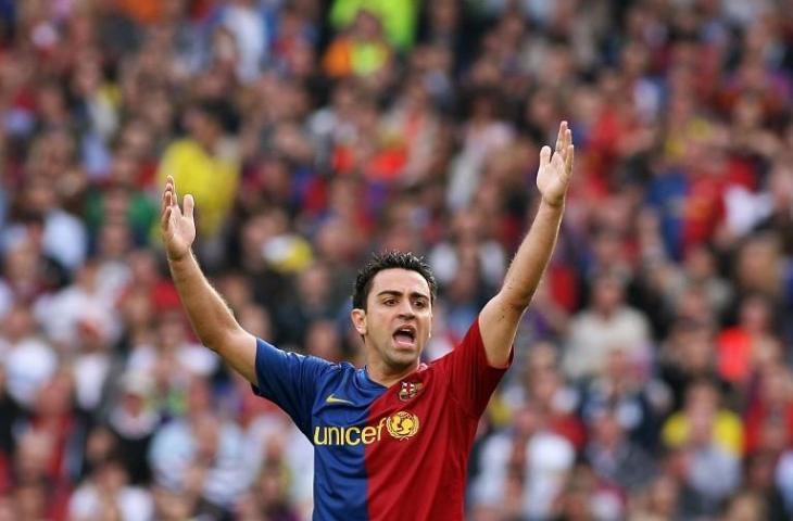 Xavi Hernandez saat bela Brcelona pada tahun 2009 (Jaime Reina/AFP)