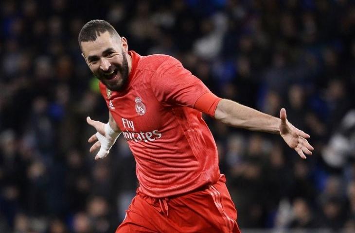 Penyerang Real Madrid, Karim Benzema cetak brace untuk kemenangan 4-2 atas Espanyol di jornada ke-21 La Liga, Senin (28/1/2019) yang dihelat di RCDE Stadium. [JOSEP LAGO / AFP]