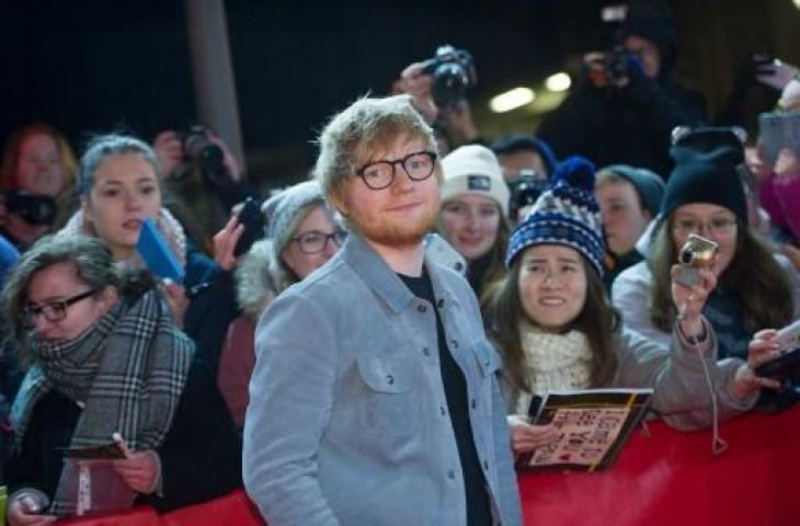 Penyanyi pop asal Inggris, Ed Sheeran. (STEFANIE LOOS / AFP)