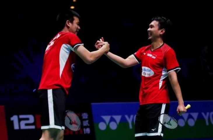 Pasangan ganda putra Indoenesia, Hendra Setiawan/Mohammad Ahsan, menjuarai All England 2019. [Antara]