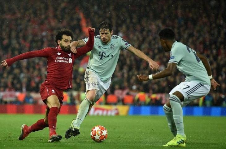 Aksi Mohamed Salah saat berhadapan dengan Bayern Munchen di leg pertama babak 16 besar Liga Champions (19/3/2019) [Oli Scarff/AFP)