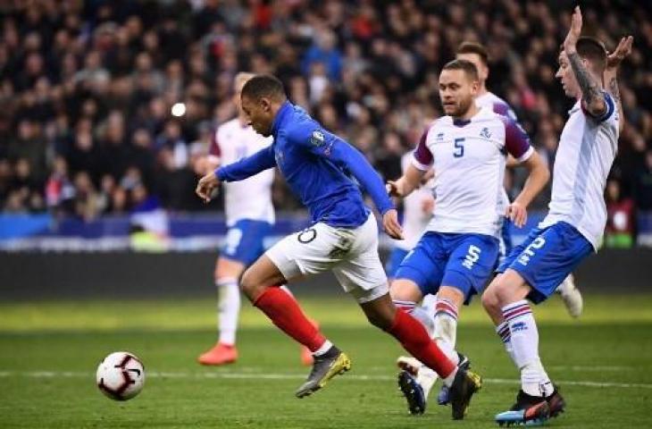 Aksi Kylian Mbappe saat Prancis menghajar Islandia dengan skor 4-0 dalam partai Grup H Kualifikasi Piala Eropa 2020 di Stade De France, Selasa (26/3/2019) dini hari WIB. (FRANCK FIFE / AFP)