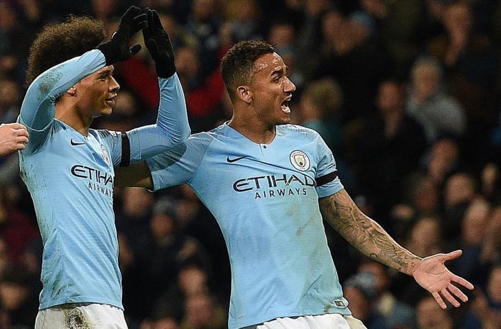 Pemain Manchester City, Leroy Sane merayakan golnya ke gawang Cardiff bersama Gabriel Jesus. Dalam laga lanjutan Liga Primer Inggris itu, Manchester City taklukkan Cardiff dengan skor 2-0. [OLI SCARFF / AFP]