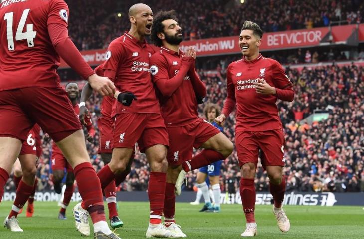 Selebrasi Mohamed Salah usai mencetak gol ke gawang Chelsea. (Paul Ellis/AFP)