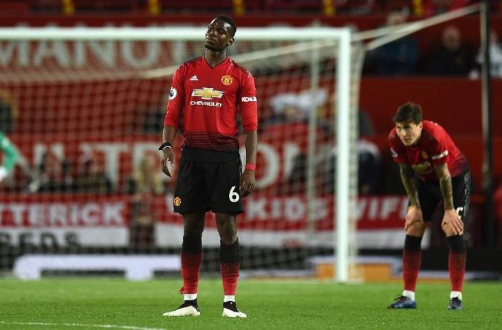 Paul Pogba usai menerima kekalahan dari Manchester City. (Olr Scarff/AFP).