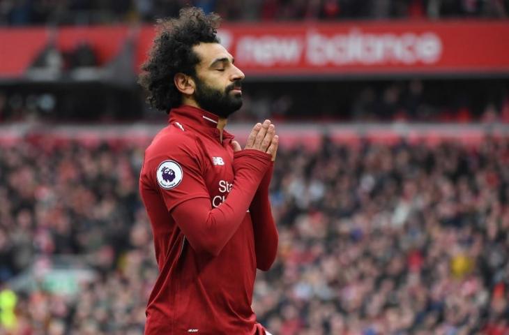 Selebrasi yoga ala Mohamed Salah. [PAUL ELLIS / AFP]