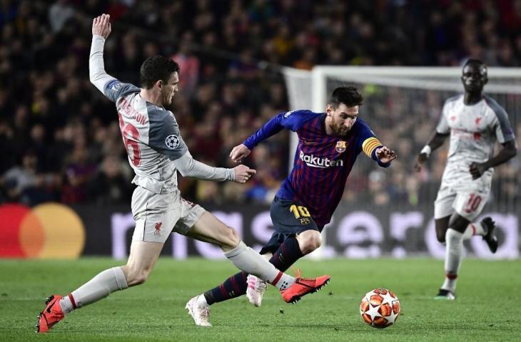 Aksi bintang Barcelona, Lionel Messi, dalam pertandingan melawan Liverpool. (Javier Soriano/AFP)