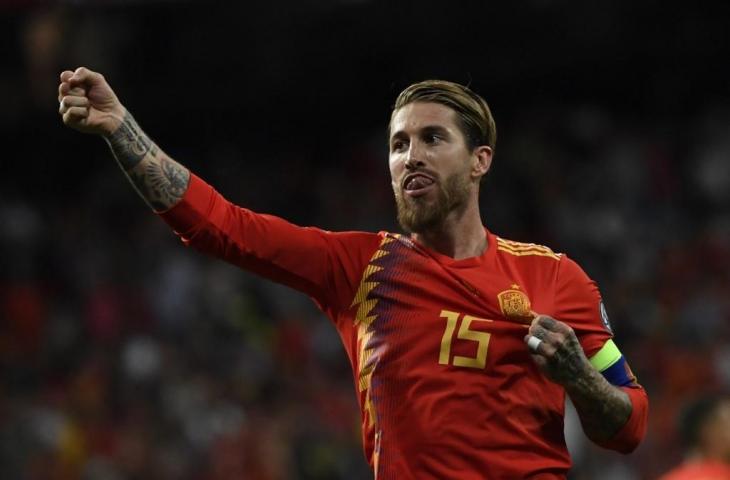 Ekspresi Sergio Ramos usai cetak gol ke gawang Swedia. Dalam laga penyisihan Grup F Kualifikasi Piala Eropa 2020, Selasa (11/6/2019) dini hari tadi, Spanyol menang 3-0 atas Swedia. [PIERRE-PHILIPPE MARCOU / AFP]