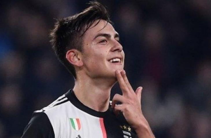 Selerasi Paulo Dybala usai mencetak gol ke gawang Atletico Madrid. (Marco Bertorello/AFP)