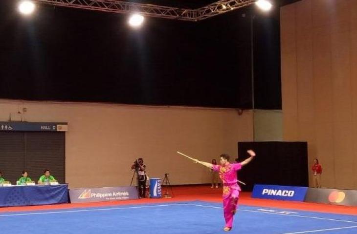 Atlet wushu Indonesia, Edgar Xavier Marvelo berhasil menyumbangkan medali emas dari nomor daoshu/gunshu combined putra SEA Games 2019, Selasa (3/12/2019). [Dok. Istimewa]