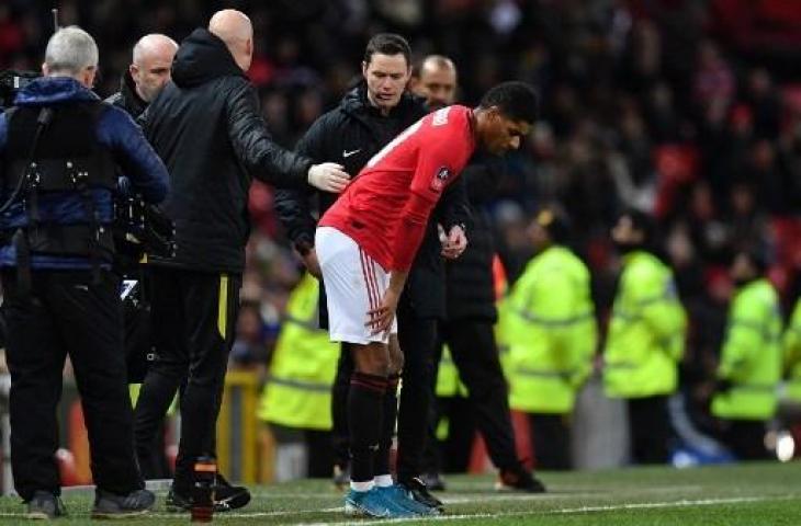 Marcus Rashford mengalami cedera saat Manchester United melawan Wolves di Piala FA. (PAUL ELLIS / AFP)