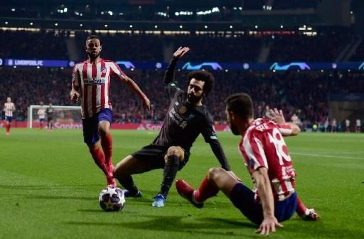 Aksi Mohamed Salah pada pertandingan melawan Atletico Madrid. (OSCAR DEL POZO / AFP)