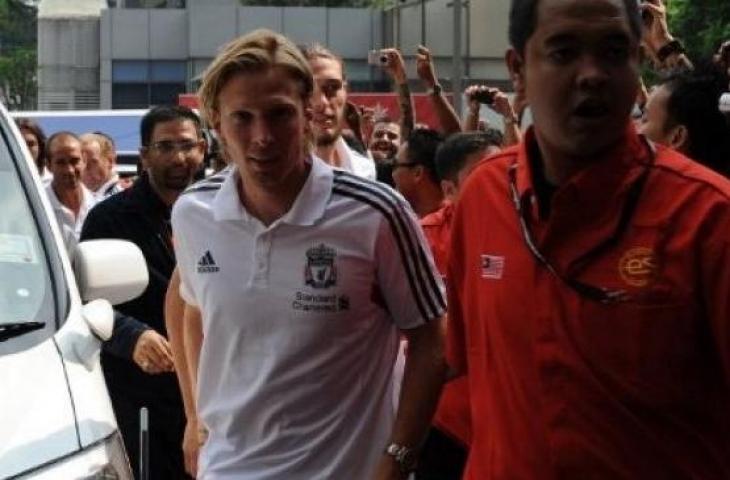 Mantan pemain Timnas Denmark, Christian Poulsen saat memperkuat Liverpool. [AFP]