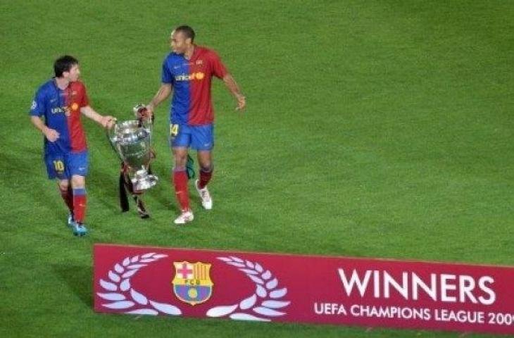 Thierry Henry dan Lionel Messi saat memenangkan Liga Champions musim 2008/2009 dengan mengalahkan Manchester United di Olympic Stadium, Roma. (MLADEN ANTONOV / AFP)