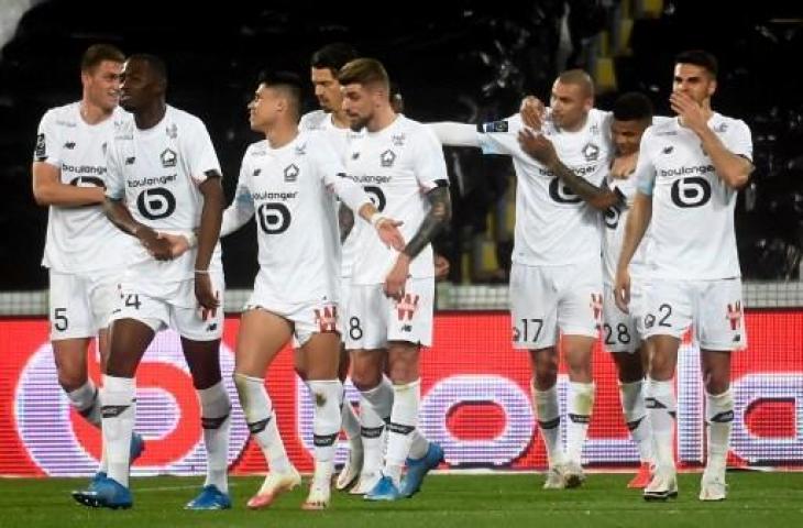 Selebrasi pemain Lille usai membobol gawang Lens dalam lanjutan Liga Prancis. (FRANCOIS LO PRESTI / AFP)