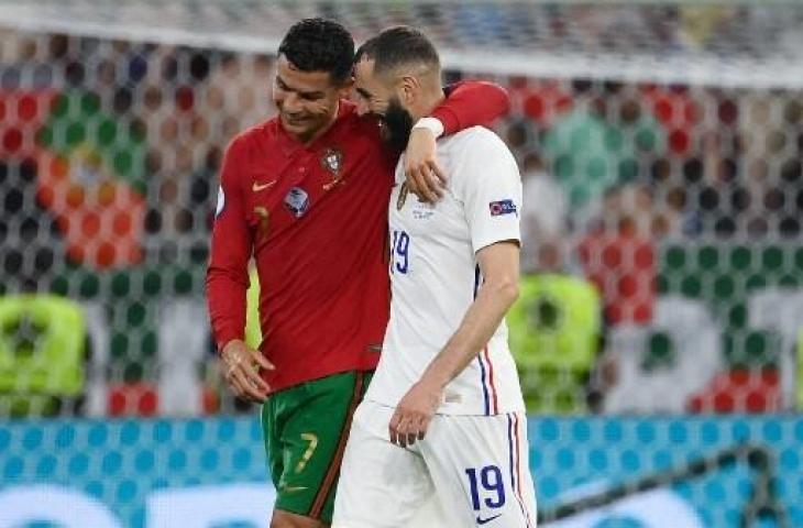 Cristiano Ronaldo dan Karim Benzema di laga Portugal vs Prancis. (FRANCK FIFE / POOL / AFP)