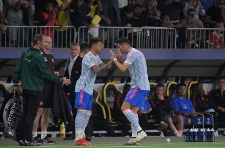 Jesse Lingard dan Cristiano Ronaldo. (Sebastien Bozon/AFP)