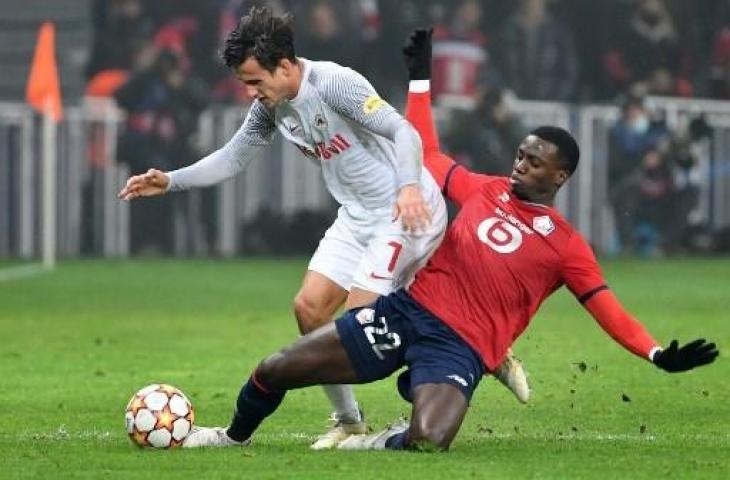 Timothy Weah (kanan) kala membela klubnya, Lille. (Denis Charlet/AFP)