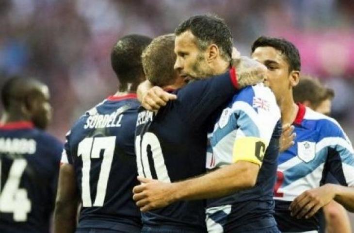 Ryan Giggs saat jadi kapten Britania Raya di Olimpiade London 2012. (ADRIAN DENNIS / AFP)