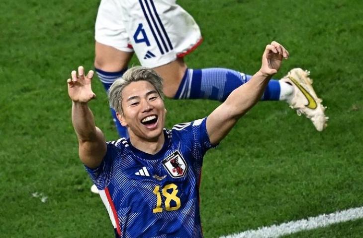 Pemain Jepang Takuma Asano saat merayakan gol ke gawang Jerman di Piala Dunia 2022. (AFP/aNNE-CHRISTINE POUJOULAT)