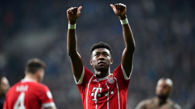 Pemain serbabisa Bayern Munich, David Alaba terancam absen di laga kontra Real Madrid (AFP/BULENT KILIC)