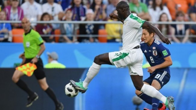 Jepang vs Senegal. (JORGE GUERRERO / AFP)