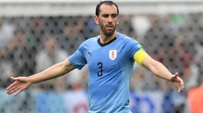 Bek sekaligus kapten Timnas Uruguay, Diego Godin di laga kontra Prancis (Kirill KUDRYAVTSEV / AFP)