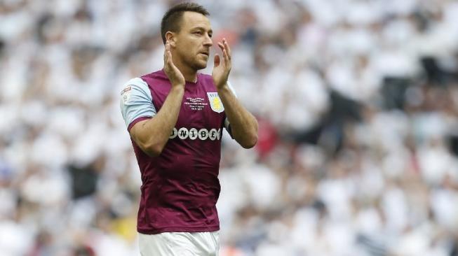 John Terry saat memperkuat Aston Villa pada Mei 2018. [Ian KINGTON / AFP]