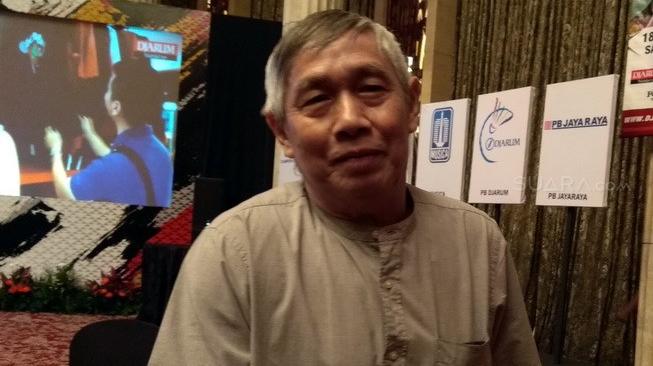 Legenda hidup bulutangkis Indonesia, Christian Hadinata, ditemui usai menghadiri konferensi pers Djarum Superliga 2019 di Hotel Indonesia Kempinski, Jakarta, Kamis (31/1/2019). [Suara.com/Arief Apriadi]