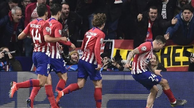 Para pemain Atletico Madrid merayakan gol Jose Gimenez (kanan) ke gawang Juventus pada laga Liga Champions di Wanda Metropolitan stadium. JAVIER SORIANO / AFP