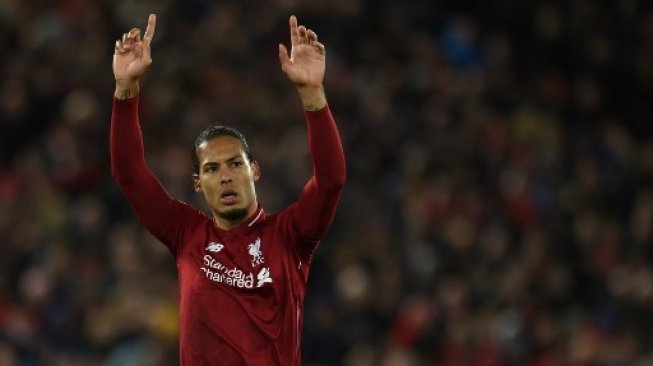 Bek Liverpool asal Belanda, Virgil van Dijk. [AFP/Oli Scarff]