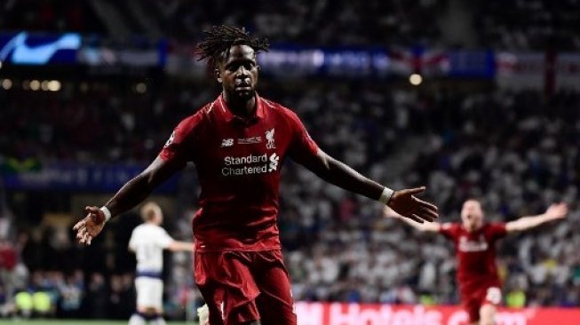 Striker Liverpool Divock Origi merayakan golnya ke gawang Tottenham Hotspur di final Liga Champions. JAVIER SORIANO / AFP