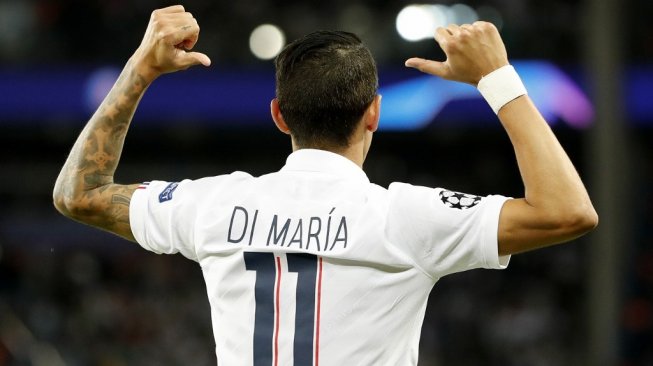 Winger Paris Saint-Germain, Angel Di Maria melakukan selebrasi usai membobol gawang Real Madrid dalam laga Liga Champions 2019/2020 di Parc des Princes, Kamis (19/9/2019) dini hari WIB. [Thomas SAMSON / AFP]