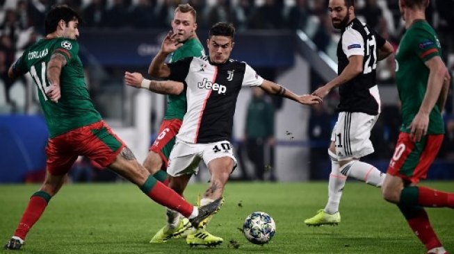 Aksi Paulo Dybala pada laga Juventus vs Lokomotiv Moscow dalam laga ketiga Grup D Liga Champions. (MARCO BERTORELLO / AFP)