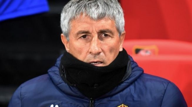 Quique Setien saat masih melatih Real Betis ketika menghadapi Rennes di Liga Europa di Roazhon Park stadium. DAMIEN MEYER / AFP